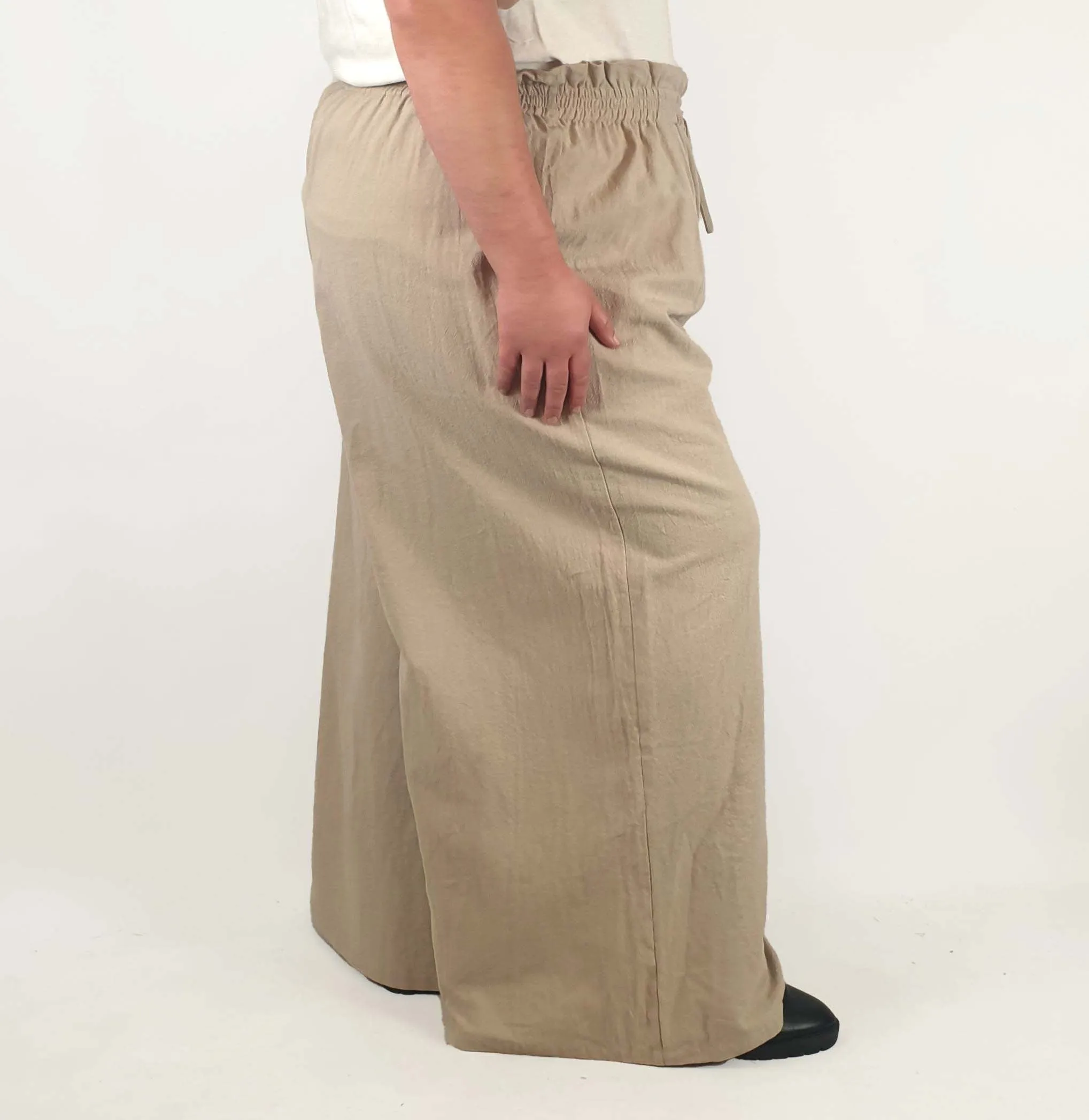 Beige wide leg drawstring pants fits size 22