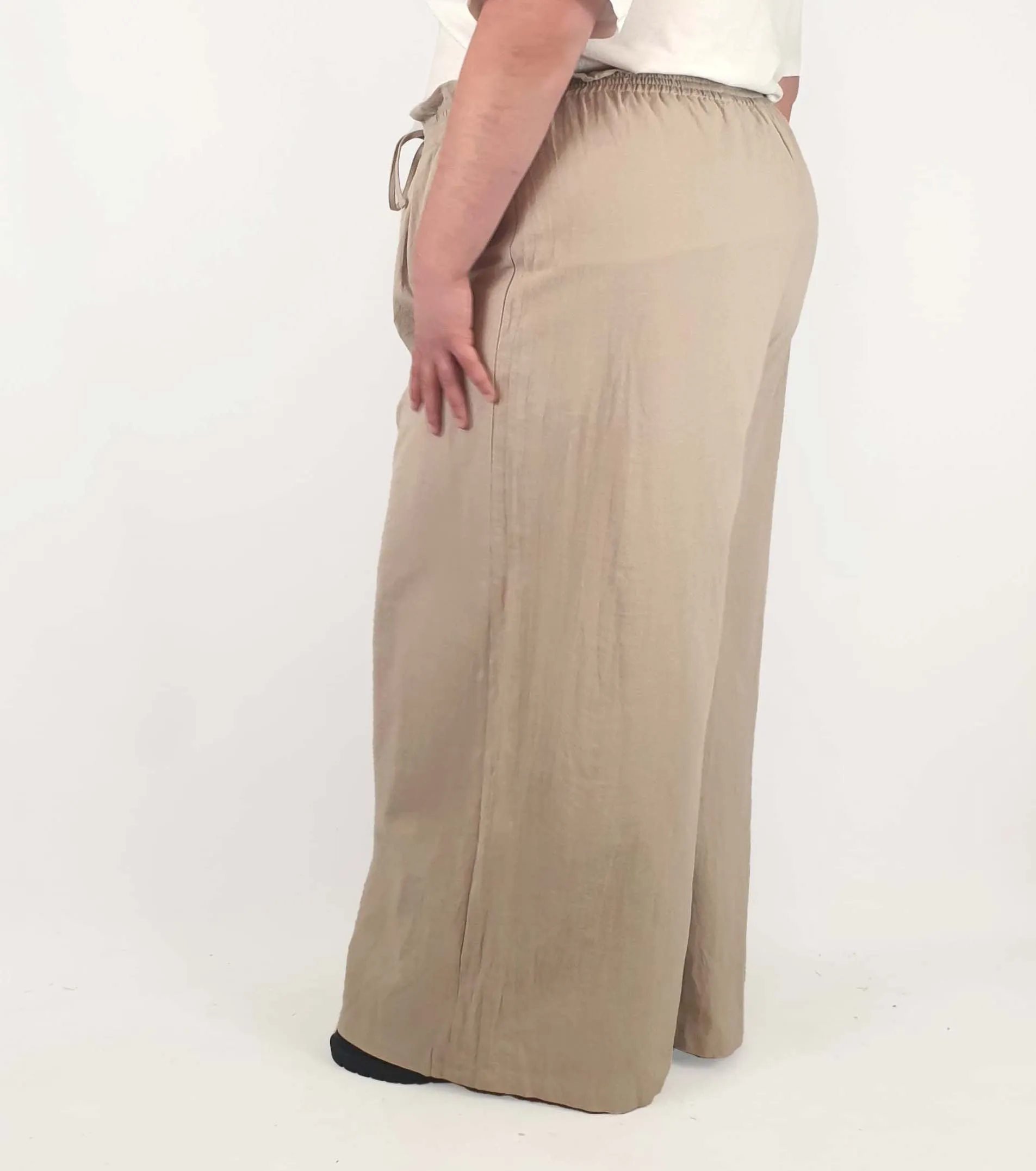 Beige wide leg drawstring pants fits size 22