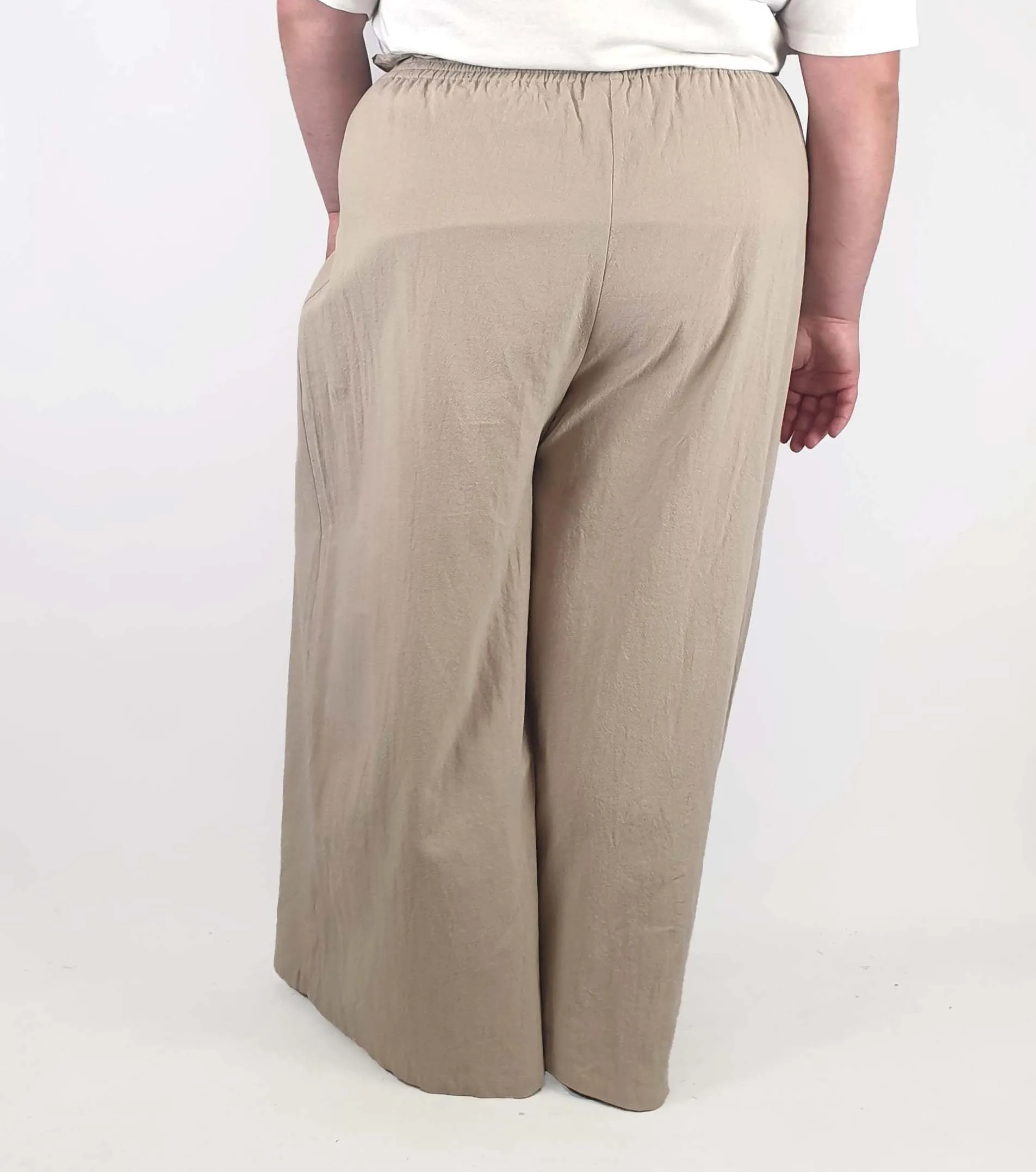 Beige wide leg drawstring pants fits size 22