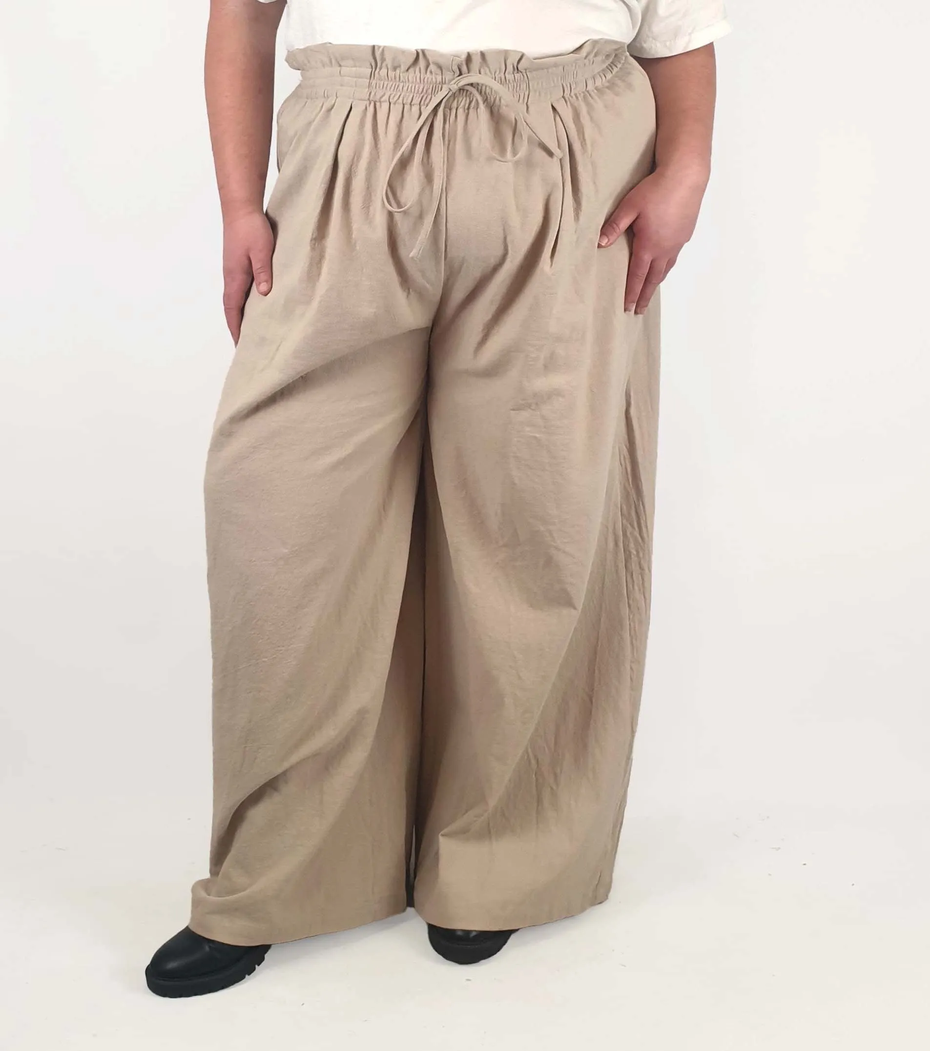 Beige wide leg drawstring pants fits size 22